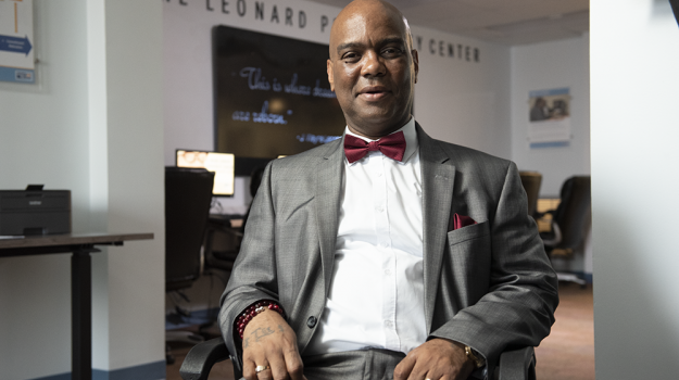 A client sitting in the J. Wayne Leonard Prosperity Center.