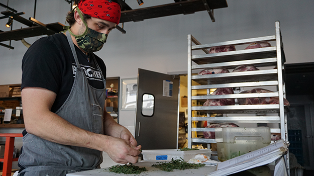 Man prepping meals 